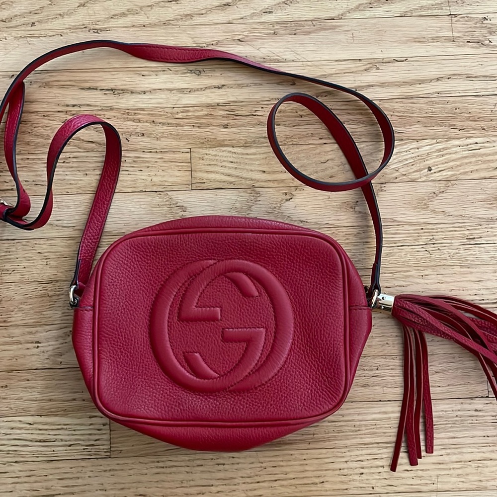 red gucci crossbody with tassel